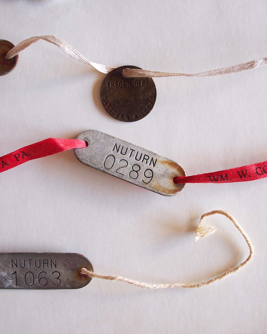 アルミと真鍮のヴィンテージタグ